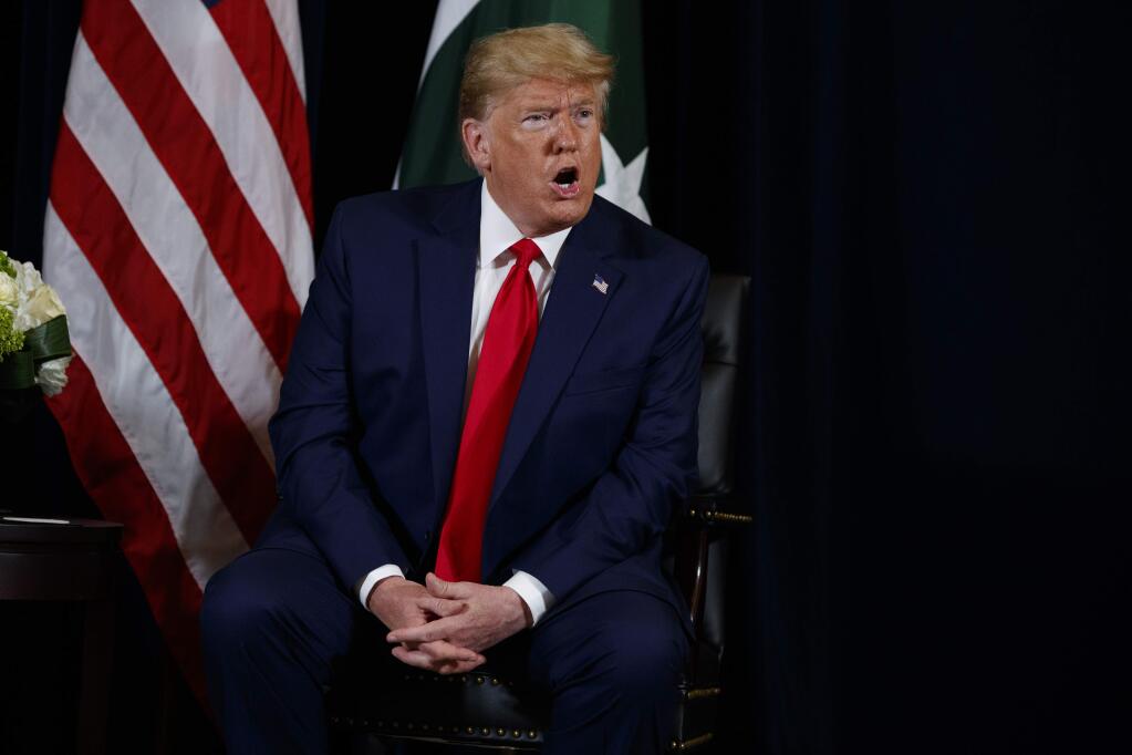 President Donald Trump speaks during a meeting with Pakistani President Ashraf Ghani at the InterContinental Barclay hotel during the United Nations General Assembly, Monday, Sept. 23, 2019, in New York. (AP Photo/Evan Vucci)