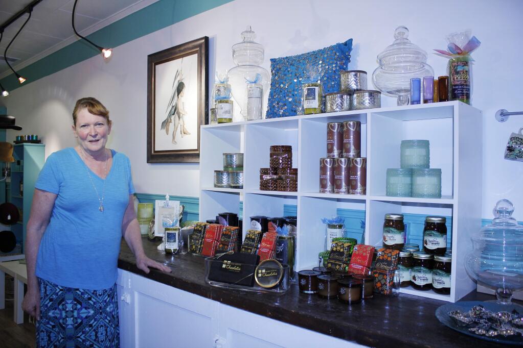 Ann CarranzaHolly Hunt, owner of the new shop Glow Healdsburg, has stocked a range of products including chocolate treats, candles and decor.