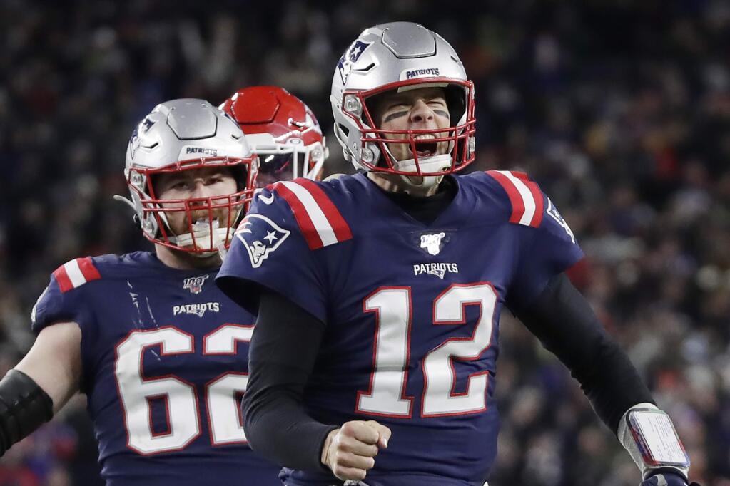 New England Patriots quarterback Tom Brady reacts after running for yardage in the fourth quarter of an NFL football game against the Kansas City Chiefs, Sunday, Dec. 8, 2019, in Foxborough, Mass. (AP Photo/Elise Amendola)