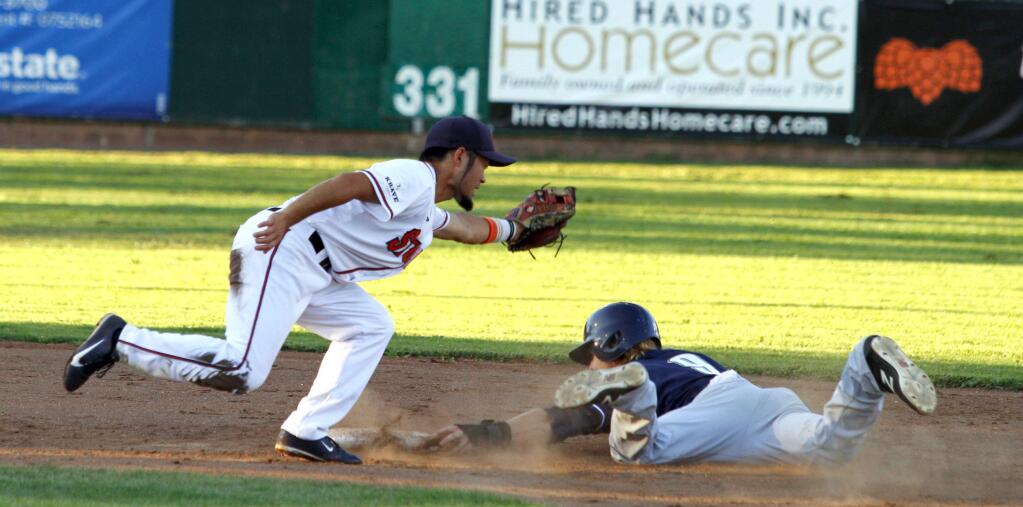 Bill Hoban/Index-TribuneStomper Yuki Yasuda tries to put a tag on a San Rafael baserunner in Friday night's game. The Pacifics swept the weekend series dropping the Stompers to third place in the second half standings.