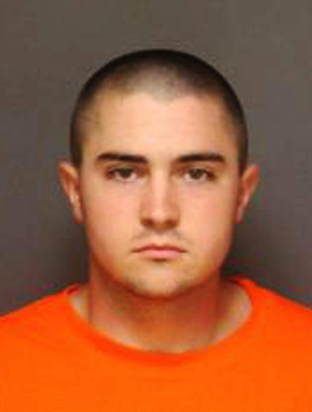 This photo released by the Fullerton, Calif., Police Department shows Josh Acosta, 21, arrested and jailed in Fullerton Sunday, Sept. 25, 2016. Acosta is one of two men arrested in connection with the murders of two men and a woman at a Fullerton home Saturday, Sept. 24. Two children were present in the home and called 911 to report that their parents had 'died.' (Fullerton Police Department via AP)
