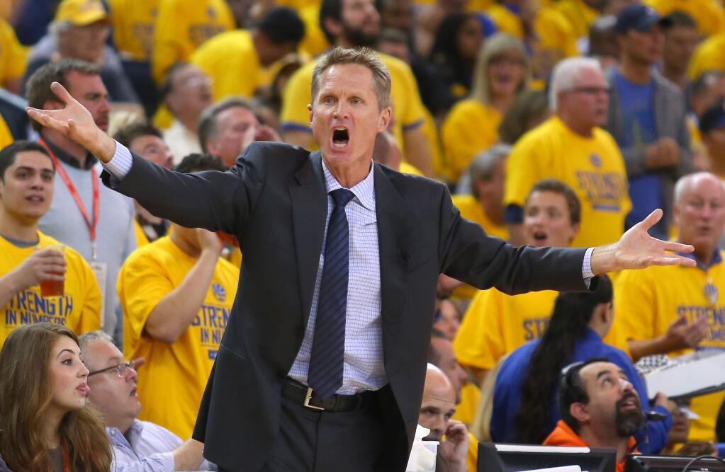 Golden State Warriors head coach Steve Kerr argues a call during Game 2 of the NBA Playoffs Western Conference Semifinals at Oracle Arena, in Oakland on Tuesday, May 5, 2015. (Christopher Chung/ The Press Democrat)
