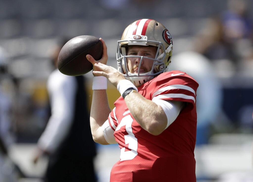 San Francisco 49ers quarterback C.J. Beathard warms up prior to a game against the Los Angeles Chargers, Sunday, Sept. 30, 2018, in Carson. (AP Photo/Marcio Sanchez)