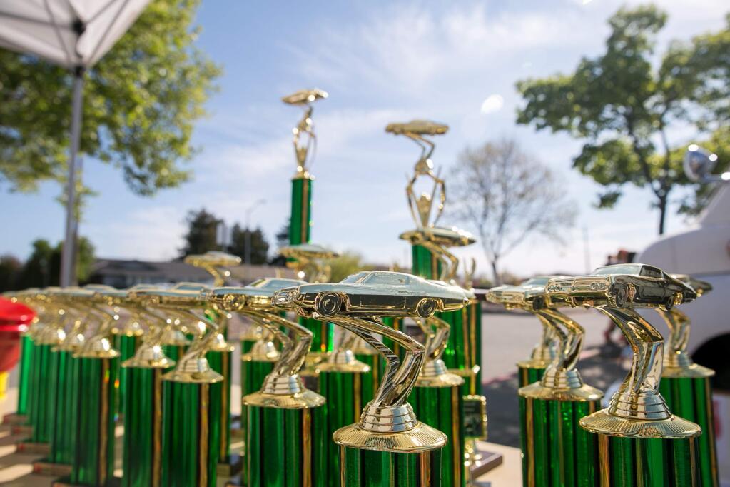 The trophies are assembled at the start of The Petaluma Salvation Army's Third Annual Car Show at Casa Grande High School on Saturday, March 28, 2015. (RACHEL SIMPSON/FOR THE ARGUS-COURIER)
