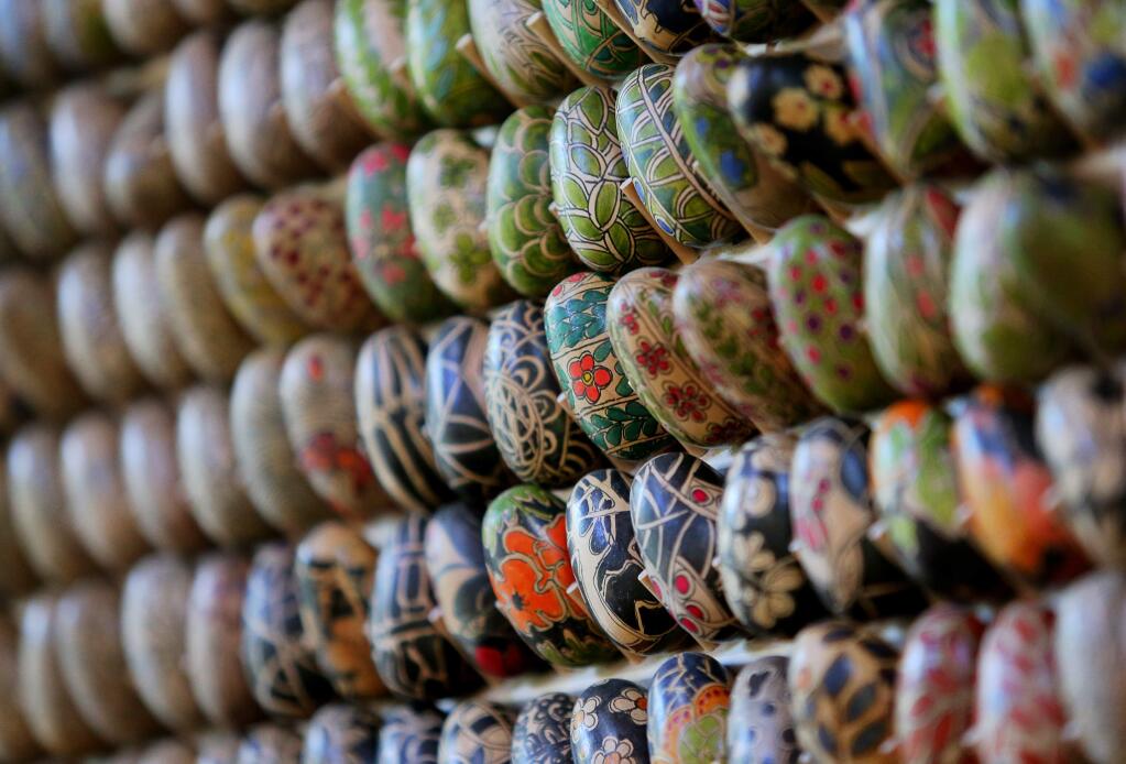 Rows of hand decorated eggs by Shari Kadar on display at her Santa Rosa home.(Christopher Chung/ The Press Democrat)