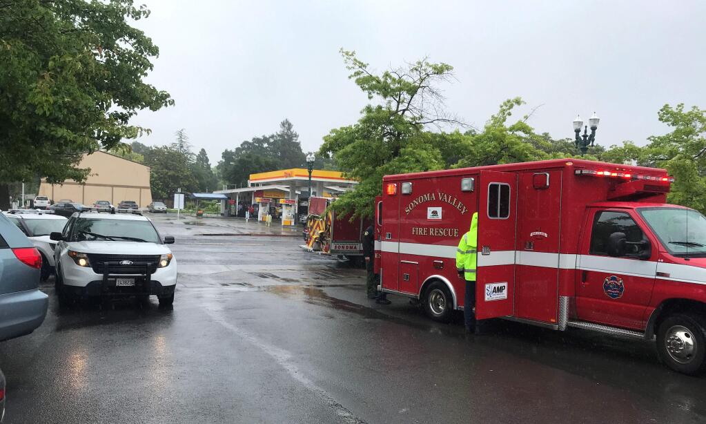 Scene at the Sonoma Post Office on Broadway as a Sonoma Valley Fire & Rescue ambulance prepares to take accident victims to Queen of the Valley Hospital, in Napa. The driver of a Mercedes SUV inadvertently hit a 3-year-old child midday in the parking lot on Wednesday, May 15, 2019. (Courtesy Sonoma Police)