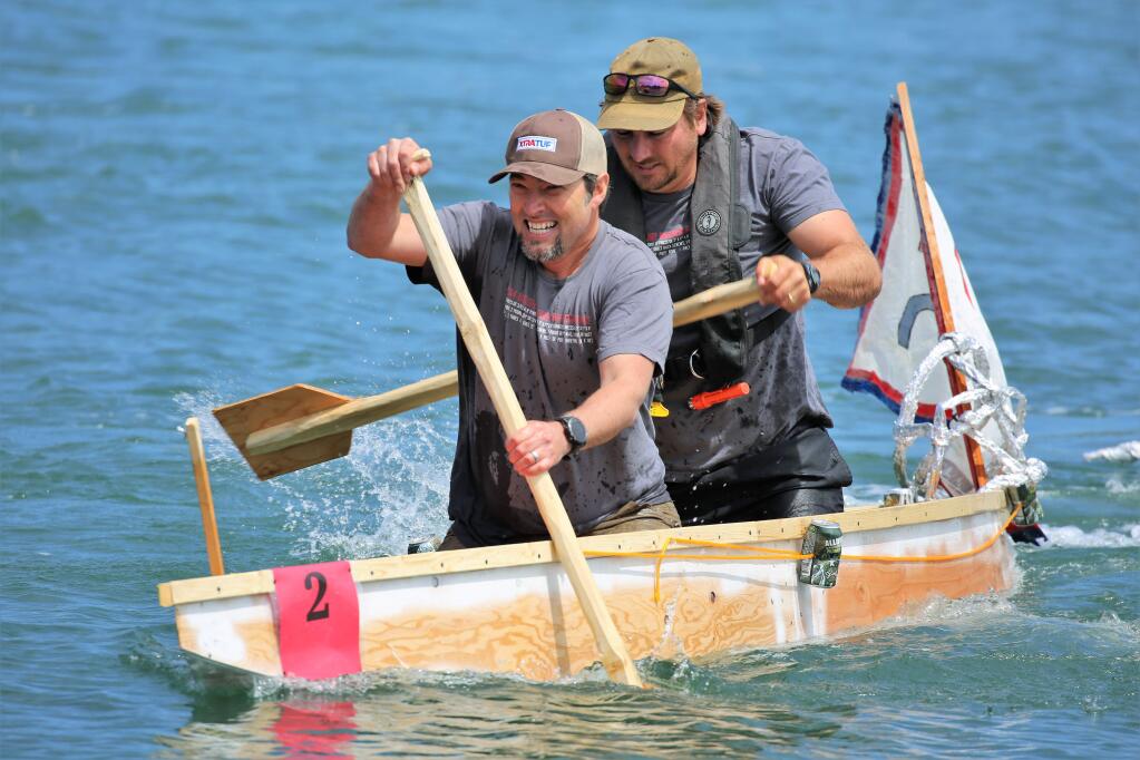 Teams race to the finish line during the Wooden Boat Challenge at the 46th Annual Bodega Bay Fisherman's Festival at Westside Park in Bodega Bay, Saturday, May 4, 2019. (WILL BUCQUOY/For the PD)