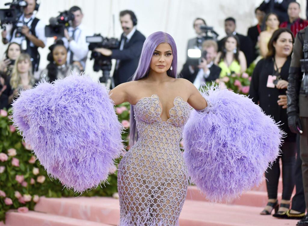 FILE - In this May 6, 2019 file photo, Kylie Jenner attends The Metropolitan Museum of Art's Costume Institute benefit gala celebrating the opening of the 'Camp: Notes on Fashion' exhibition in New York. Jenner has been hospitalized with an undisclosed illness and will have to skip a planned cosmetics rollout at Paris Fashion Week. The 22-year-old social media star and makeup mogul said on Twitter Wednesday, Sept. 25, 2019, that she's 'really sick and unable to travel.' (Photo by Charles Sykes/Invision/AP, File)