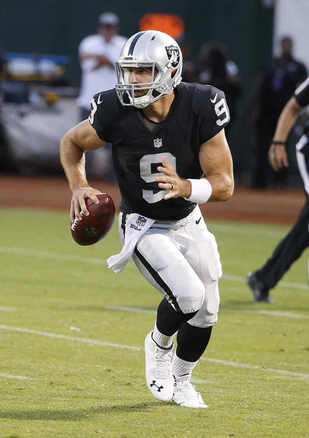 Oakland Raiders quarterback Christian Ponder (9) against the St. Louis Rams during the second half of an NFL preseason football game in Oakland, Calif., Friday, Aug. 14, 2015. (AP Photo/Tony Avelar)