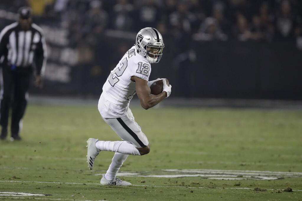 Oakland Raiders wide receiver Zay Jones runs against the Los Angeles Chargers during the first half in Oakland, Thursday, Nov. 7, 2019. (AP Photo/Ben Margot)