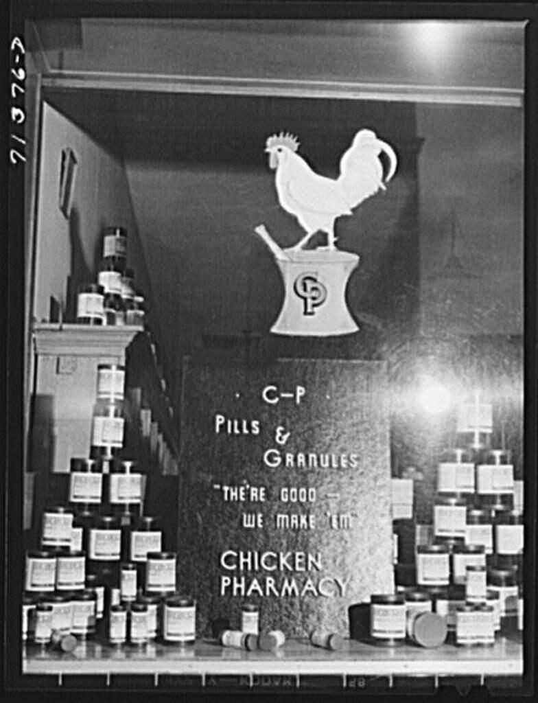 Sign on a chicken pharmacy. Petaluma, a town of 8000 persons, is built around the production of eggs and baby chicks. All of its industries such as the feed mills, warehouses, transportation, and trucking concerns are part of egg production. January 1942. (Russell Lee / Yale Photogrammar)