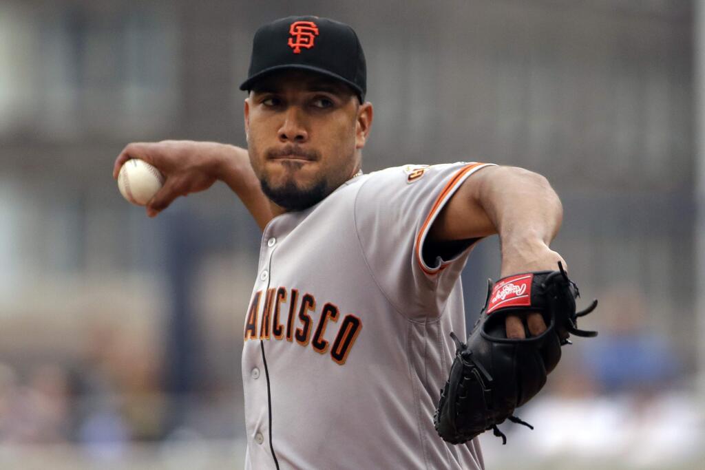San Francisco Giants starting pitcher Albert Suarez delivers in the first inning against the Pittsburgh Pirates in Pittsburgh, Thursday, June 23, 2016. (AP Photo/Gene J. Puskar)