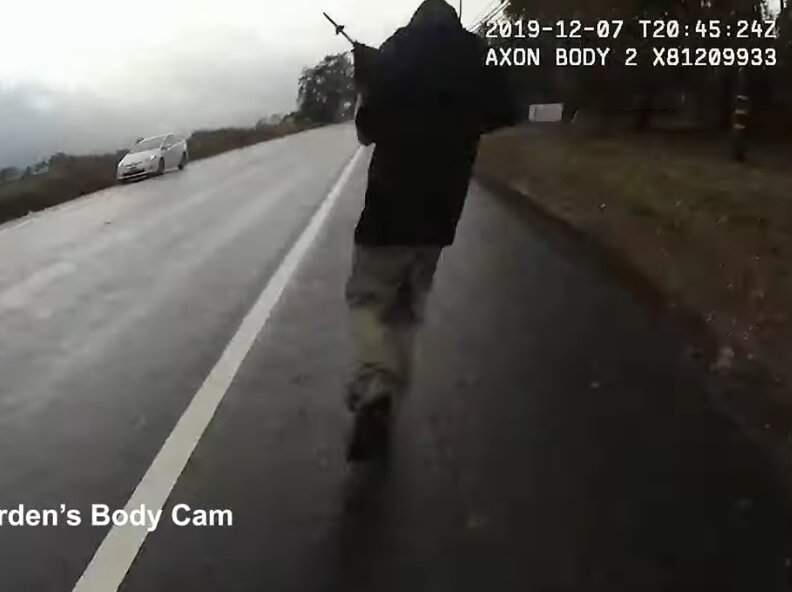 A screenshot from body-cam video showing the pursuit and arrest of a suspect last month moments after a Santa Rosa police officer fired three shots at the man, believing the umbrella he was carrying was a gun. (SANTA ROSA POLICE DEPARTMENT)