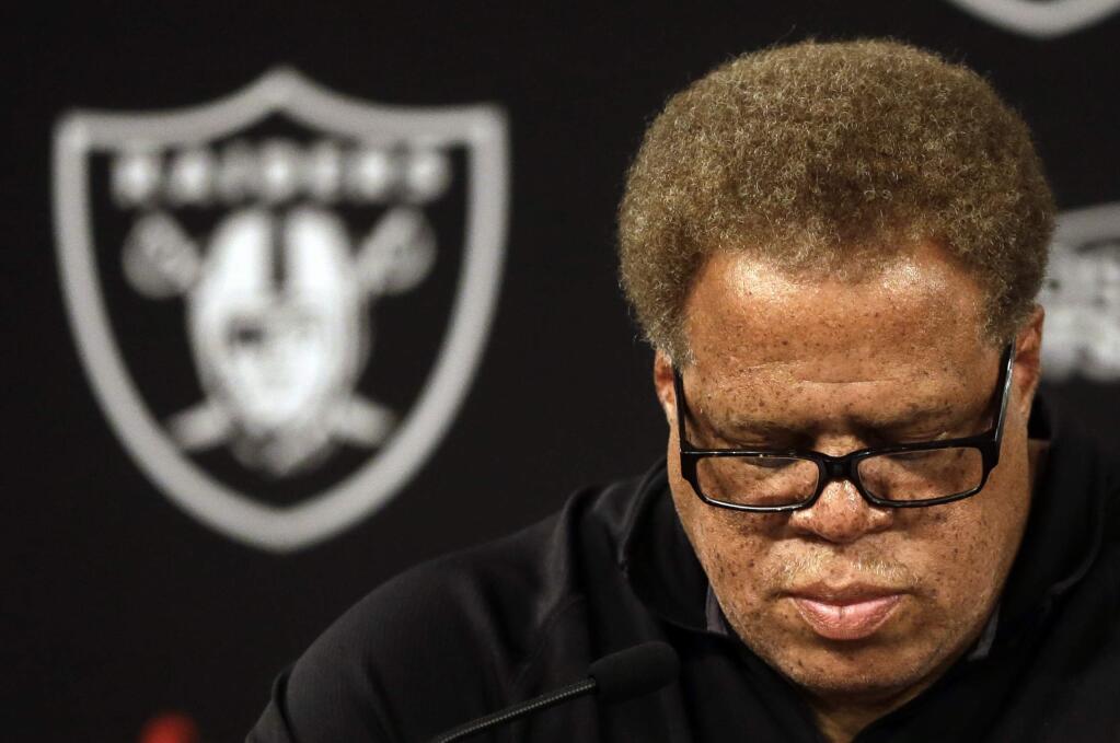 Oakland Raiders general manager Reggie McKenzie takes questions from reporters during a media conference Tuesday, Sept. 30, 2014, in Alameda. The Oakland Raiders named Tony Sparano as their interim head coach. (AP Photo/Ben Margot)