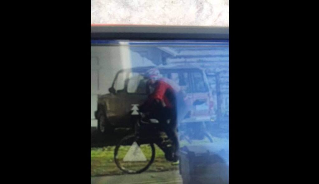 Police are searching for this cyclist, who they say pushed a 68-year-old woman to the ground during a scuffle in Kenwood.