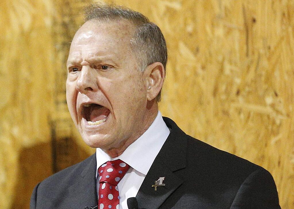 Former Alabama Chief Justice and U.S. Senate candidate Roy Moore speaks at a campaign rally, Thursday, Nov. 30, 2017, in Dora, Ala. (AP Photo/Brynn Anderson)