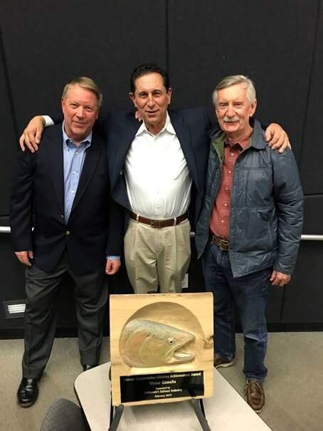 THE BIG CATCH: (L-R) GGSA president John McManus; founding member, past president and honoree Victor Gonella and current GGSA chairman and founder of West Marine Randy Repass.