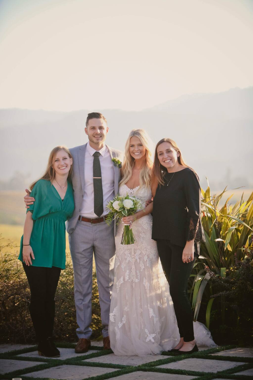 Wedding planners Kalika Ansel (far left) and Brittany Rogers-Hanson (far right) with groom Will White and bride Harrison Sap who, with Hanson's support, overcame obstacles to have their Wine Country wedding Wednesday. (photo courtesy of Runawaywithme weddings)