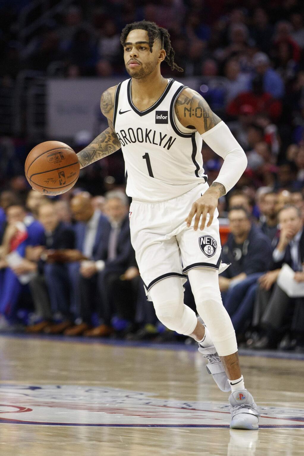 The Brooklyn Nets' D'Angelo Russell in action during the second half in Game 2 of a first-round playoff series against the Philadelphia 76ers, Monday, April 15, 2019, in Philadelphia. Russell is now with the Warriors. (AP Photo/Chris Szagola)