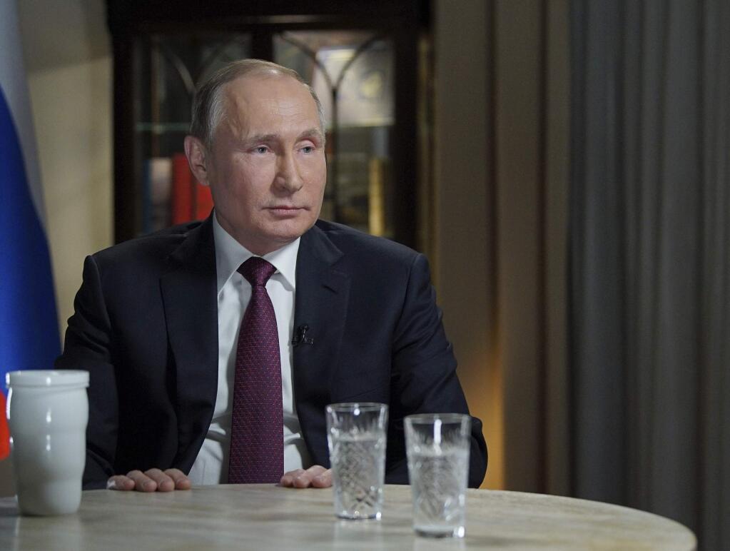 In this photo taken on Friday, March 2, 2018 and released Saturday, March 10, 2018, Russian President Vladimir Putin speaks during an interview with NBC News' Megyn Kelly in Kaliningrad, Russia. In the some times combative interview Putin denied the charge by U.S. intelligence services that he ordered meddling in the November 2016 vote, claiming any interference was not connected to the Kremlin. (Alexei Druzhinin, Sputnik, Kremlin Pool Photo via AP)