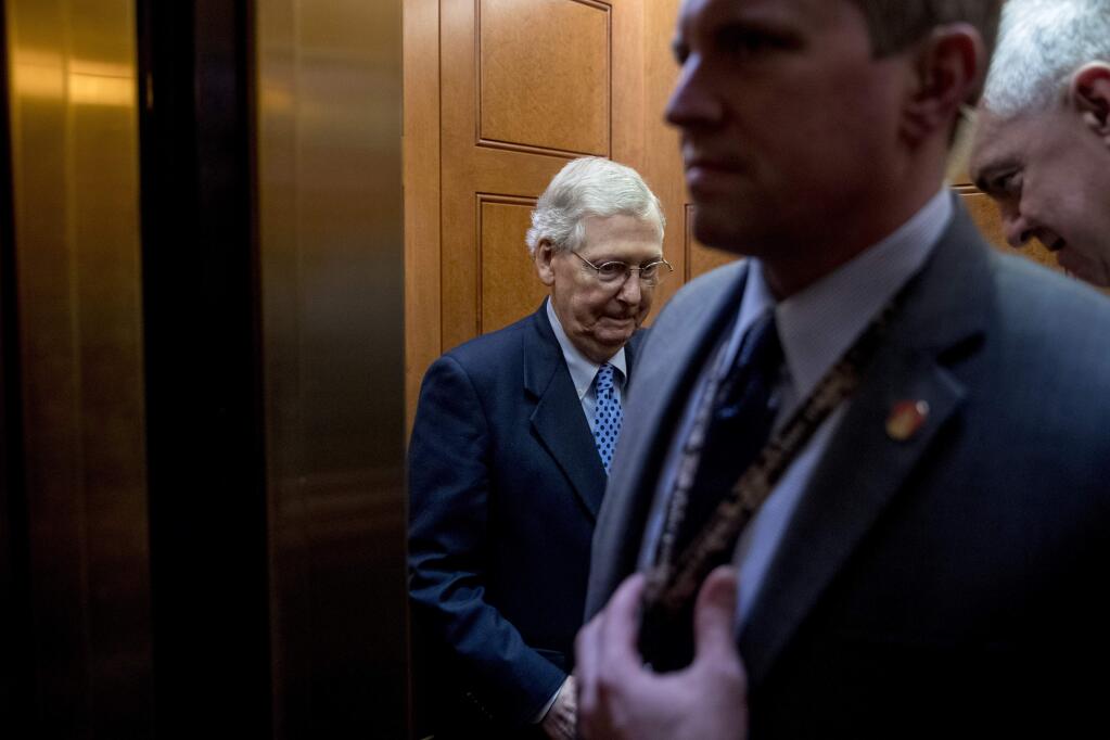 Senate Majority Leader Mitch McConnell of Ky., leaves the Senate Chamber on Capitol Hill, Monday, Feb. 11, 2019, in Washington. (AP Photo/Andrew Harnik)