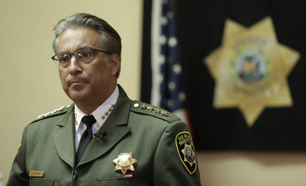 In this July 6, 2015, file photo, San Francisco Sheriff Ross Mirkarimi fields questions during an interview in San Francisco. Mirkarimi was already fighting for his political life. Then his jail released a Mexican national wanted by federal immigration authorities who wanted to deport the man for the sixth time. The jails decision to release Juan Francisco Lopez-Sanchez, who is charged with randomly shooting to death a young San Francisco woman shortly after his release, has placed Mirkarimi squarely in the center of a national debate over immigration. (AP Photo/Ben Margot, File)