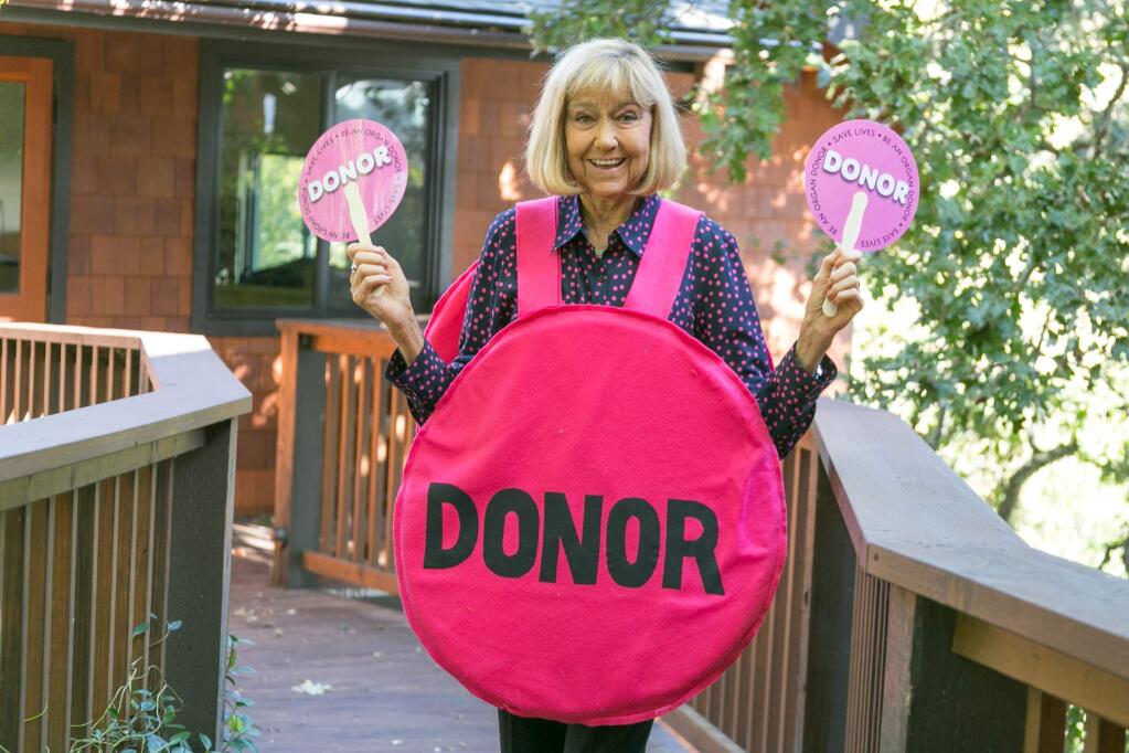 Pink is the new black: Marcie Waldron demonstrates the lengths she will go to for her organ-donation drive. (Julie Vader/Special to the Index-Tribune)