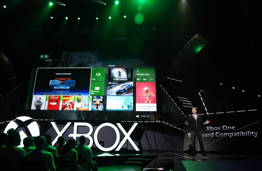 IMAGE DISTRIBUTED FOR MICROSOFT - Mike Ybarra, Head of Platform Engineering, Xbox, discusses details of Xbox One Backward Compatibility at the Xbox E3 2015 Briefing on Monday, June 15, 2015 in Los Angeles. (Photo by Casey Rodgers/Invision for Microsoft/AP Images)