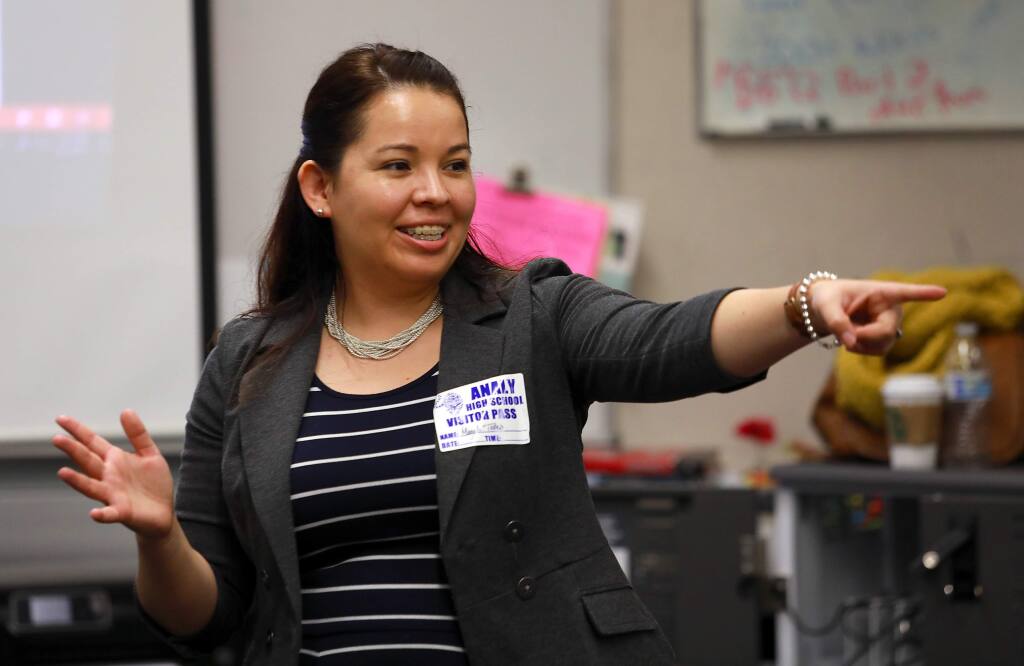Sonoma State University college readiness coordinator Magali Telles talks about requirements with a class of juniors at Analy High School in Sebastopol. (John Burgess/The Press Democrat)