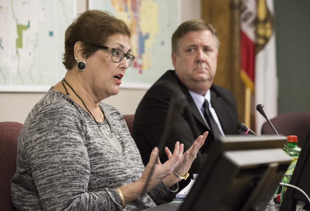 Councilmember Madolyn Agrimonti, shown above in October with David Cook, expressed her disappointment Monday at the lack of progress on a city cannabis ordinance.