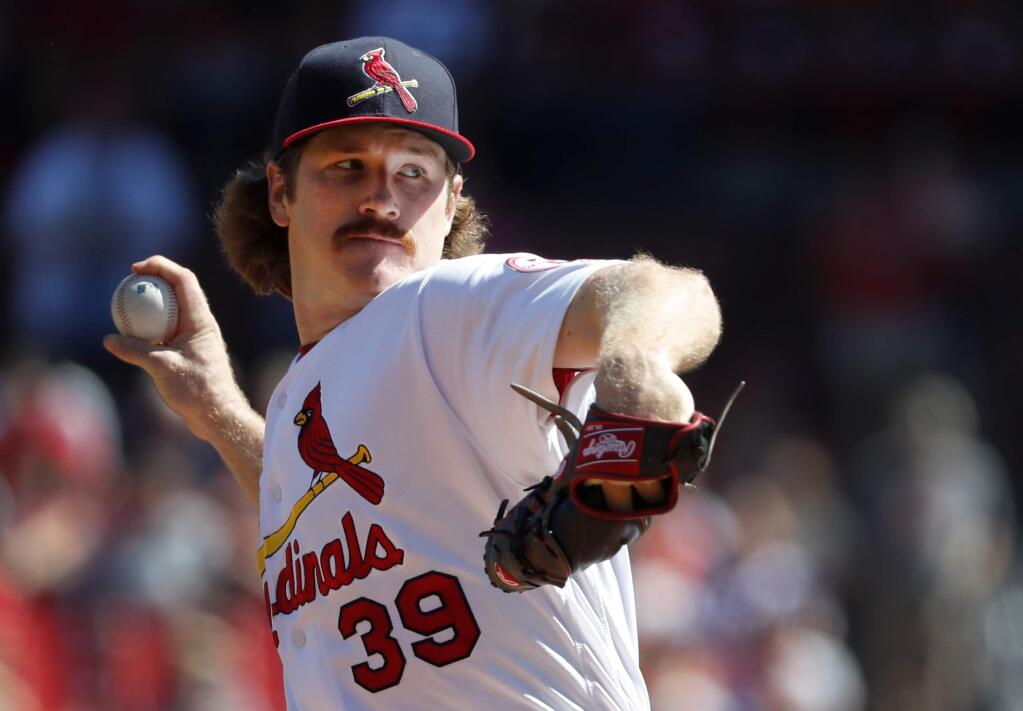 St. Louis Cardinals starting pitcher Miles Mikolas throws during the first inning of a baseball game against the San Francisco Giants Sunday, Sept. 23, 2018, in St. Louis. (AP Photo/Jeff Roberson)
