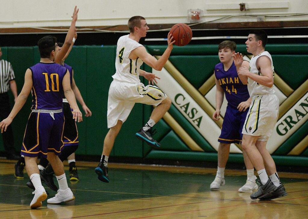 SUMNER FOWLER/FOR THE ARGUS-COURIERCasa Grande's Ian Cerruti helped keep the Gauchos close with drives and assists, but Ukiah prevailed at the end, 72-57.
