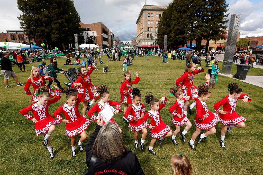 The Keenan Irish Dancers warm up before performing on stage during St. Paddy's Day on the Square at Old Courthouse Square in Santa Rosa, California, on Saturday, March 17, 2018. (Alvin Jornada / The Press Democrat)