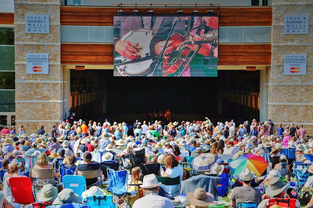 Concert goers to the Green Music center enjoy the music on the lawn during the Dawg Day Afternoon July 12, 2015 concert.