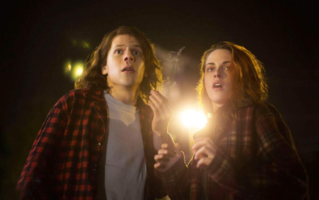 Jesse Eisenberg as Mike, an apparent hapless small-town stoner, and Kristen Stewart as his girlfriend Pheobe in 'American Ultra.' (Lionsgate)
