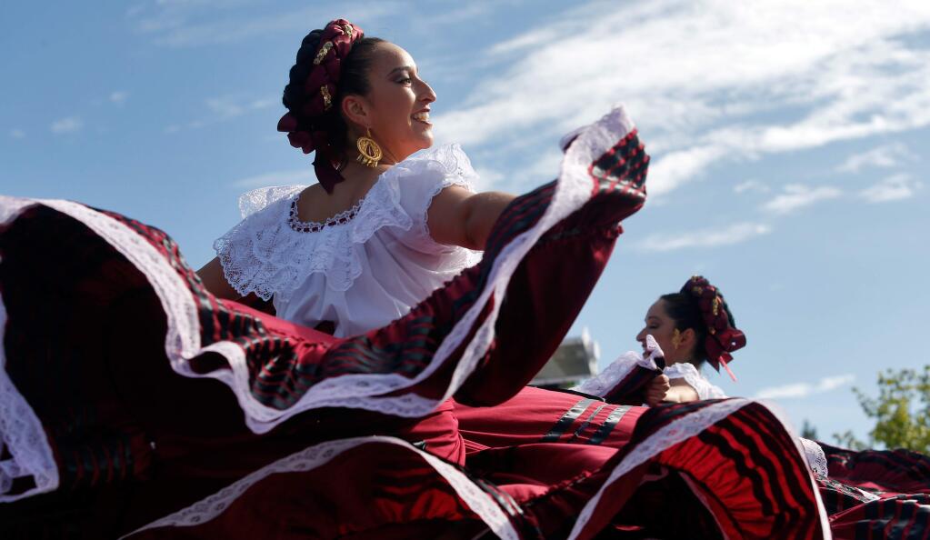 Mireya Pinell-Cruz, left, and Diana Reveles, cofounders of V!va Folklorico perform on stage during the Roseland Cinco de Mayo festival, in Santa Rosa, California, on Saturday, May 5, 2018. (Alvin Jornada / The Press Democrat)
