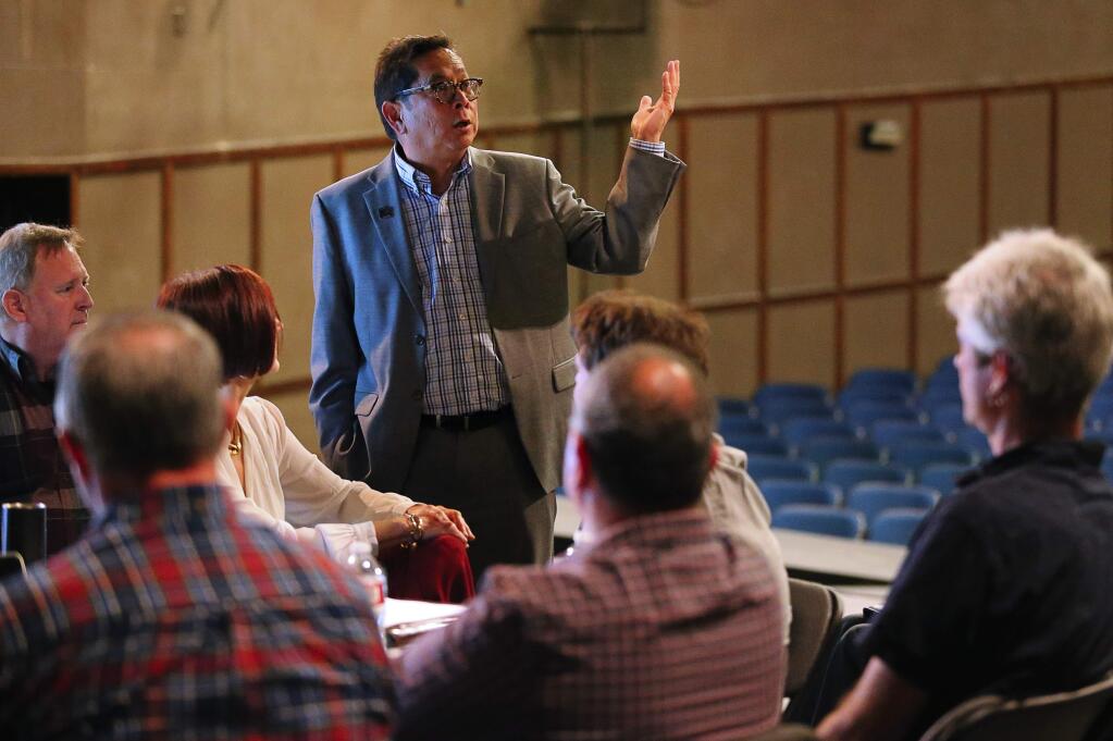 SRJC President Dr. Frank Chong talks to the planning group as they discuss the renovation of the Burbank Auditorium, in Santa Rosa, on Tuesday, August 23, 2016. (Christopher Chung/ The Press Democrat)