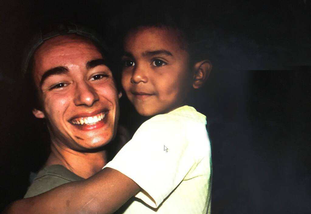 Sonoma Valley High School senior Brandon Barmore with a Nicaraguan student in a photo taken during the Seeds of Learning service trip last week. (Submitted)