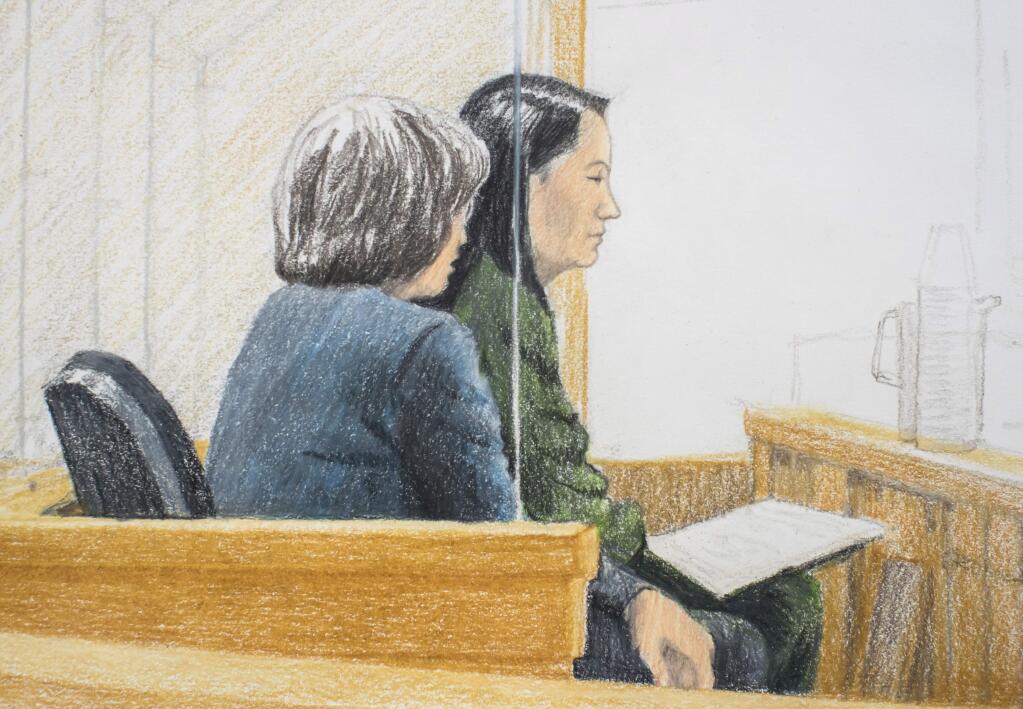 Meng Wanzhou, the CFO of Huawei Technologies, is shown in a courtroom sketch made during a bail hearing Friday in Vancouver, British Columbia. She faces extradition to the United States. (JANE WOLSAK / Canadian Press)