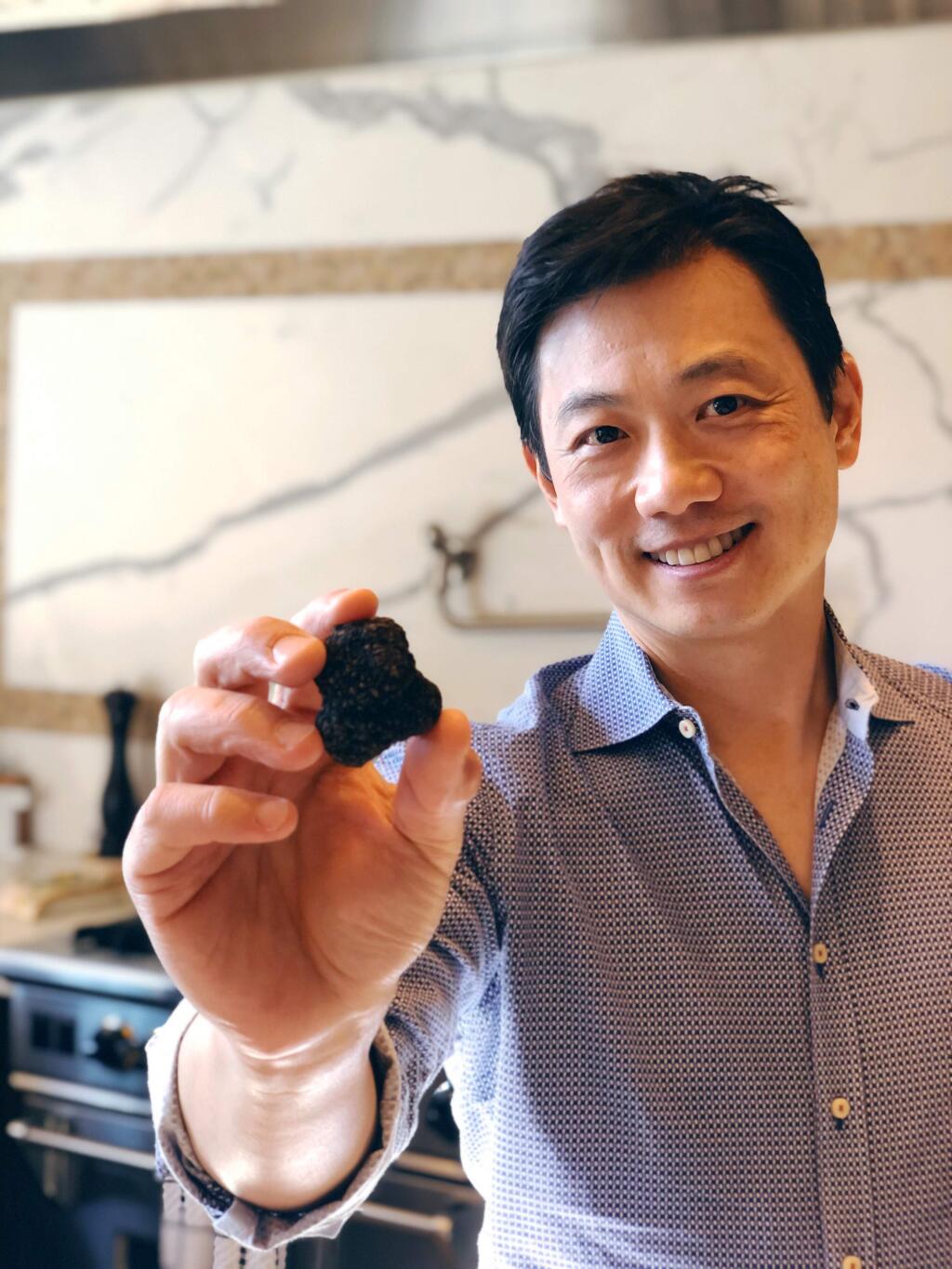 Robert Chang, managing director and chief truffle officer of the American Truffle Company. holds the first harvested Burgundy Black Truffle from the Otellini Truffle Orchard in Sonoma County using ATC's scientific cultivation technology. (American Truffle Company photo)