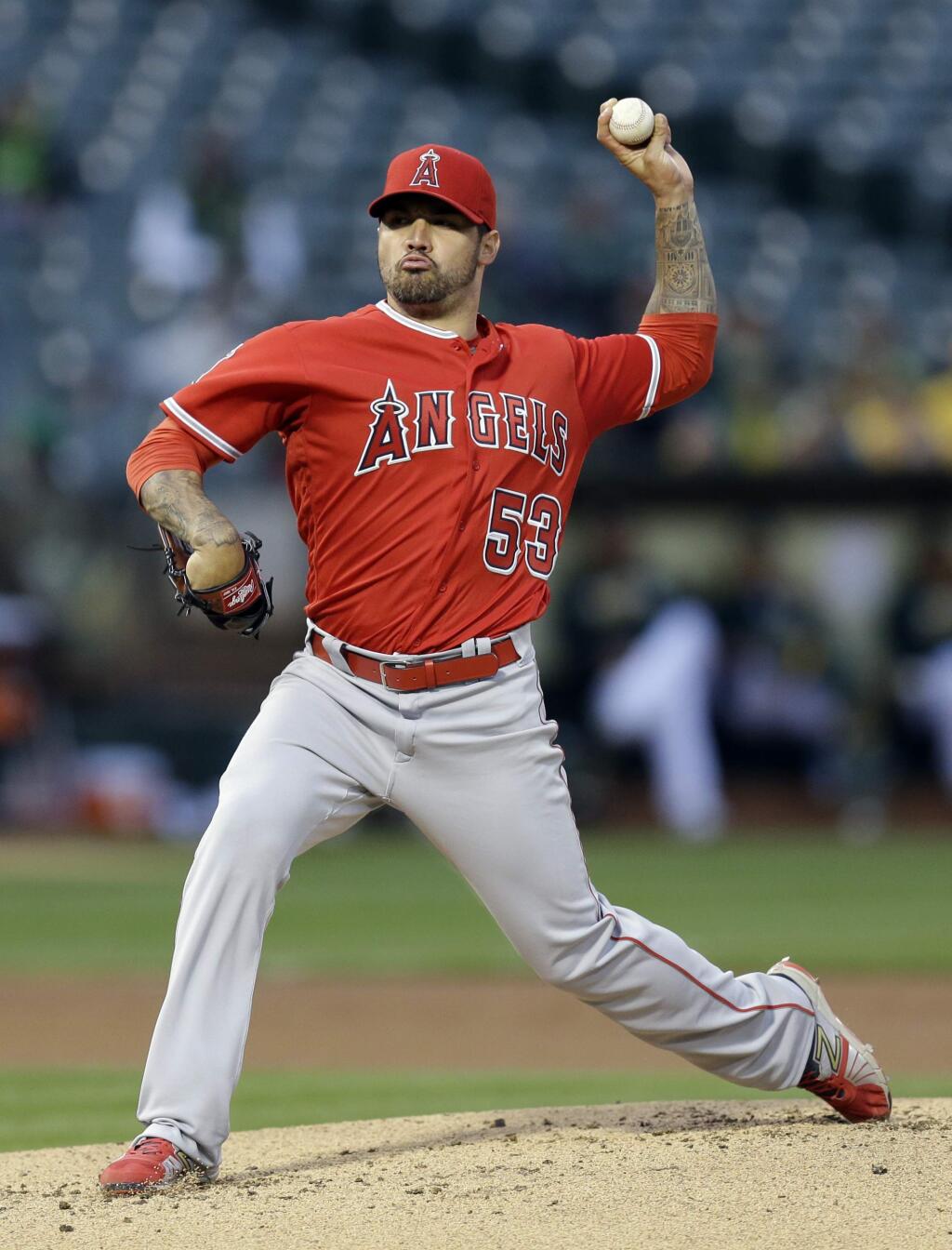 Los Angeles Angels pitcher Hector Santiago works against the Oakland Athletics in the first inning of a baseball game Tuesday, April 12, 2016, in Oakland, Calif. (AP Photo/Ben Margot)