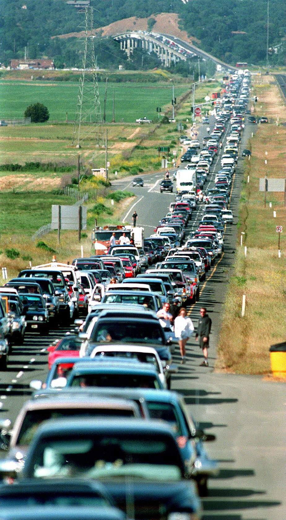 The NASCAR Toyota/Save Mart 350 finals on Sunday invariably draws big crowds and creates extensive traffic backups, especially eastbound on Highway 37. Some delays can be 2-1/2 hours or more. In the background is the port of Sonoma and the bridge that goes over the Petaluma River. (Kent Porter / Press Democrat file)
