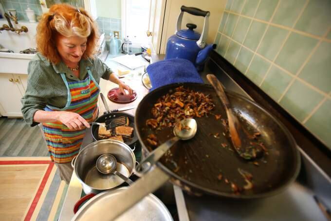 Kay Baumhefner prepares a fall feast of squash soup and porcini mushroom grilled cheese sandwich at her home in Petaluma in 2013. (CHRISTOPHER CHUNG/ PD FILE)