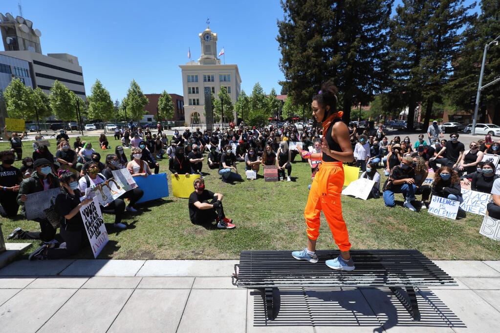 Joy Ayodele speaks to protesters before a march in Old Courthouse Square, in Santa Rosa on Monday, June 1, 2020. (Christopher Chung/ The Press Democrat)