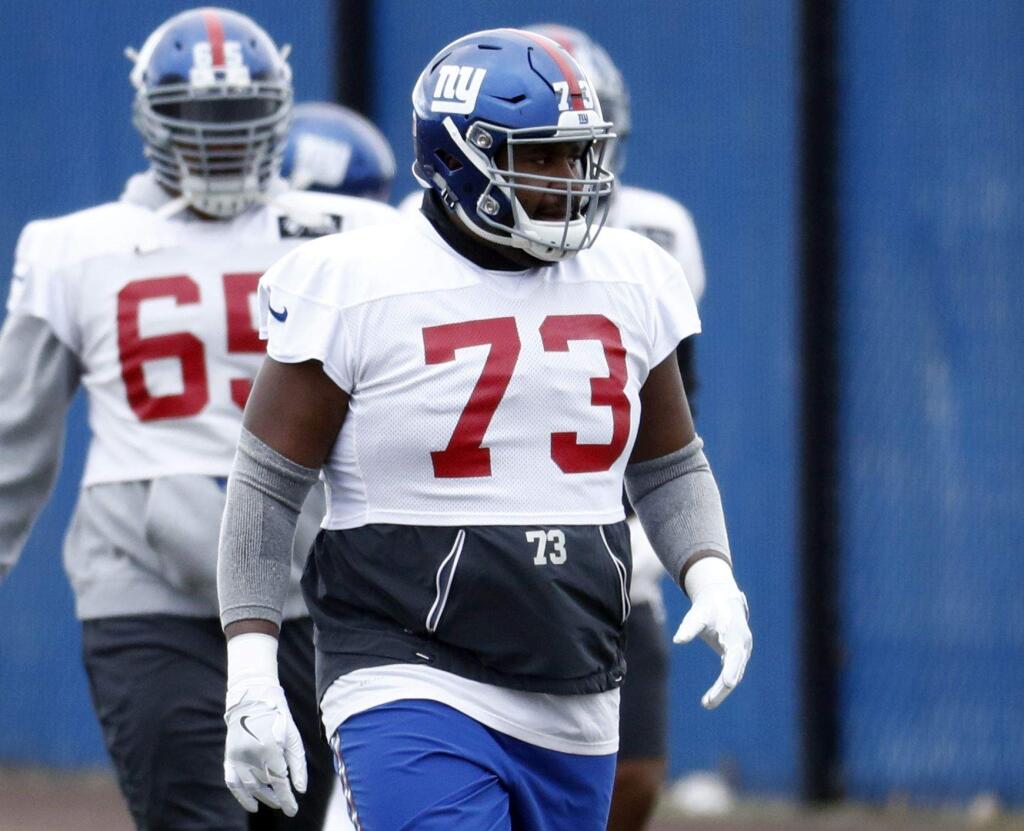 New York Giants offensive guard Marshall Newhouse (73) works out during practice Wednesday, Dec. 28, 2016, in East Rutherford, N.J. (AP Photo/Julio Cortez)
