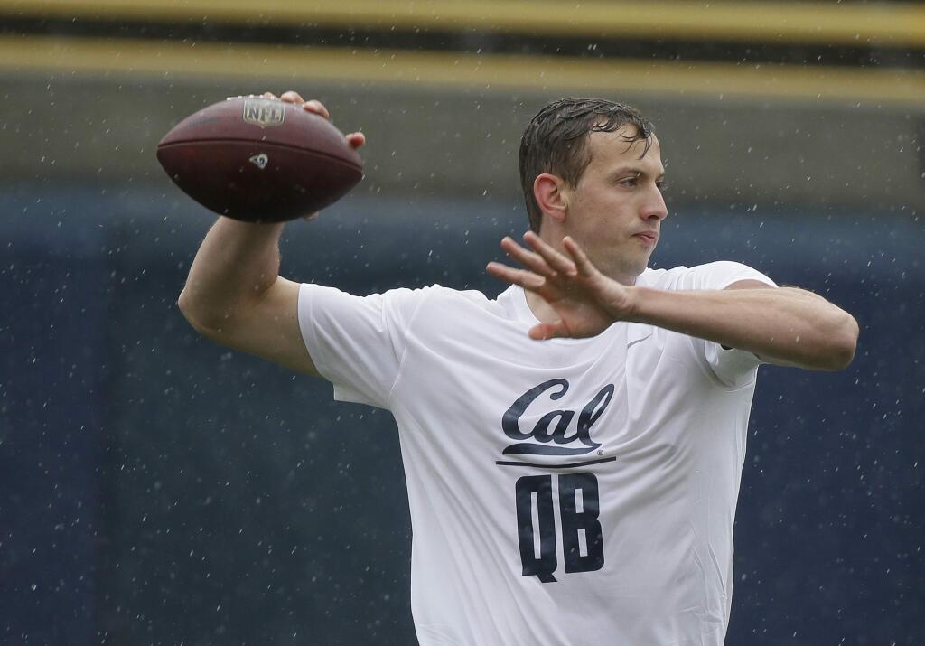 In this March 24, 2017 photo, Cal quarterback Davis Webb throws during Cal's pro day in Berkeley. (AP Photo/Eric Risberg)