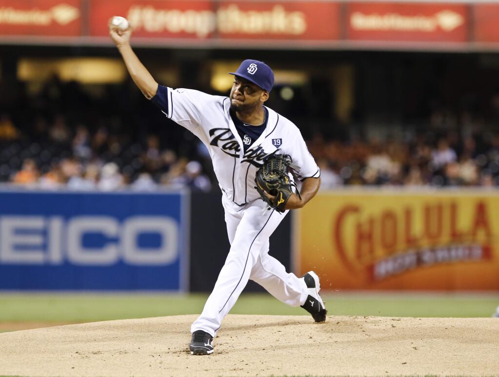 San Diego Padres starting pitcher Odrisamer Despaigne throws against the San Francisco Giants during the first inning of a baseball game Friday, Sept. 19, 2014, in San Diego. (AP Photo/Don Boomer)