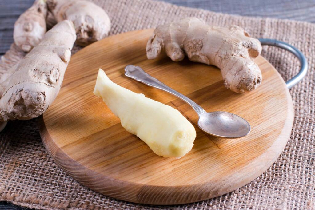 Peel ginger with a spoon.