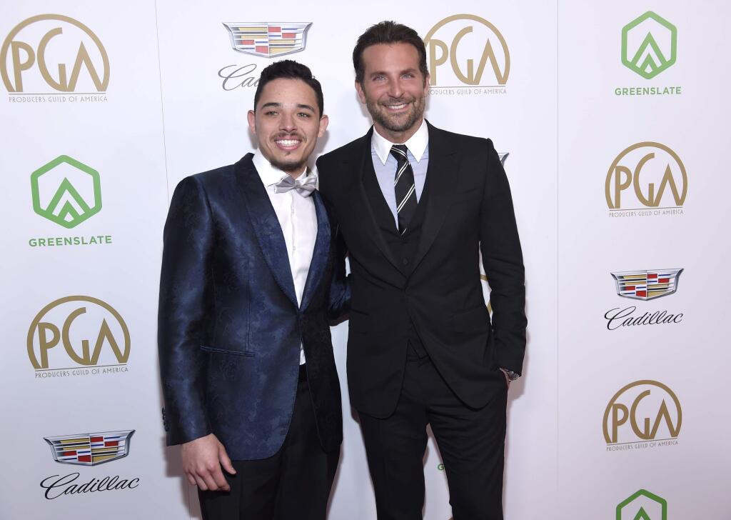 Anthony Ramos, left, and Bradley Cooper arrive at the Producers Guild Awards on Saturday, Jan. 19, 2019, at the Beverly Hilton Hotel in Beverly Hills, Calif. (Photo by Chris Pizzello/Invision/AP)