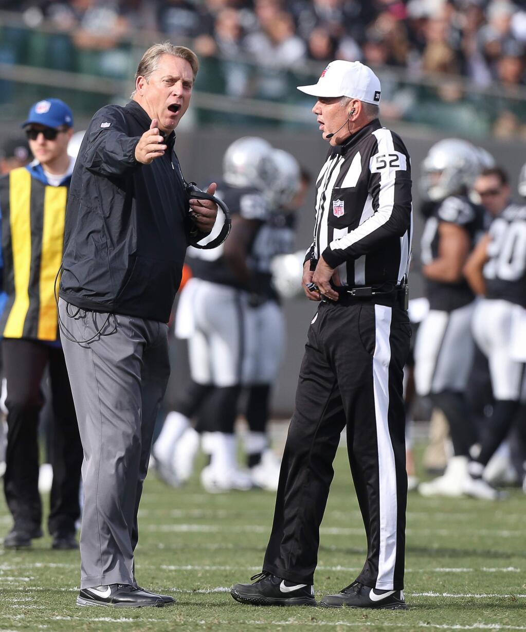 Oakland Raiders head coach Jack Del Rio argues a call during their game against the Buffalo Bills in Oakland on Sunday, December 4, 2016. The Raiders defeated the Panthers 38-24. (Christopher Chung/ The Press Democrat)